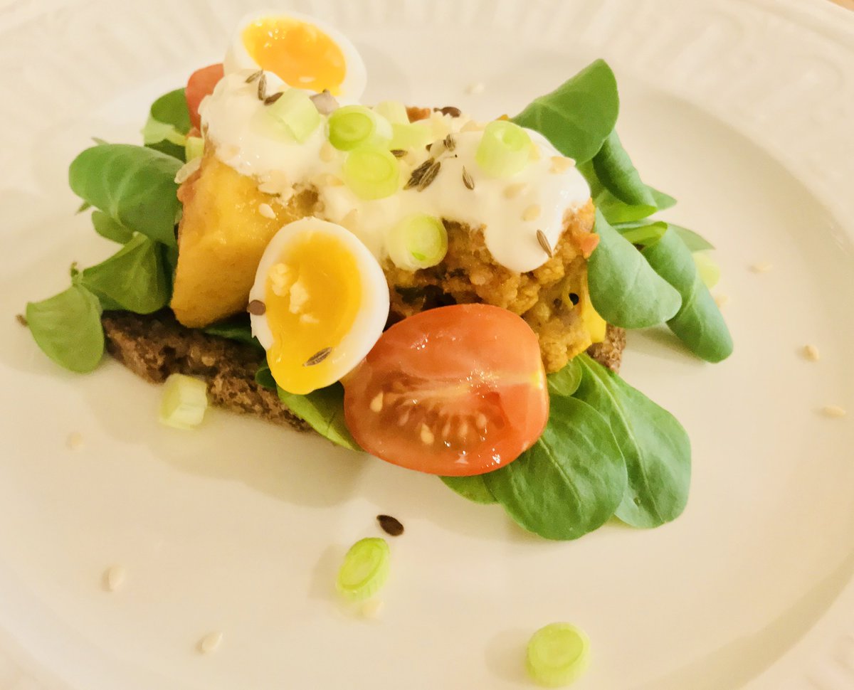 GoodEveningFood's tweet image. Summer eating with a warm cauliflower &amp;amp; potato curry served on a bed of lambs lettuce and rye bread with sour cream. Delicious piled high with cherry tomatoes, spring onions and a softly boiled quails egg with sprinkles of toasted cumin seeds #vegetarian