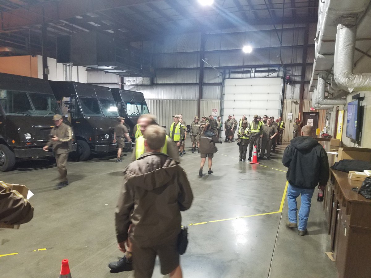 SafetyStJoe's tweet photo. Distracted walking. Drivers walked a course while reading a diad message outloud on their way to package cars. Workgroup was pretty focused on message did they see the hazard written on ground. Message will be sent later what the hazard was that was written on the floor. https://t.co/HowGkrwJwg