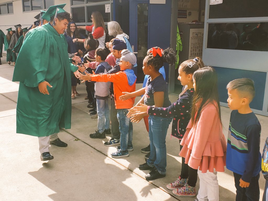 PrincipalRec's tweet photo. Clovis East graduation walk...one of the best days of the year. Graduates return to their elementary school and walk the halls one last time. Such a special day! https://t.co/2PMOktpDjI