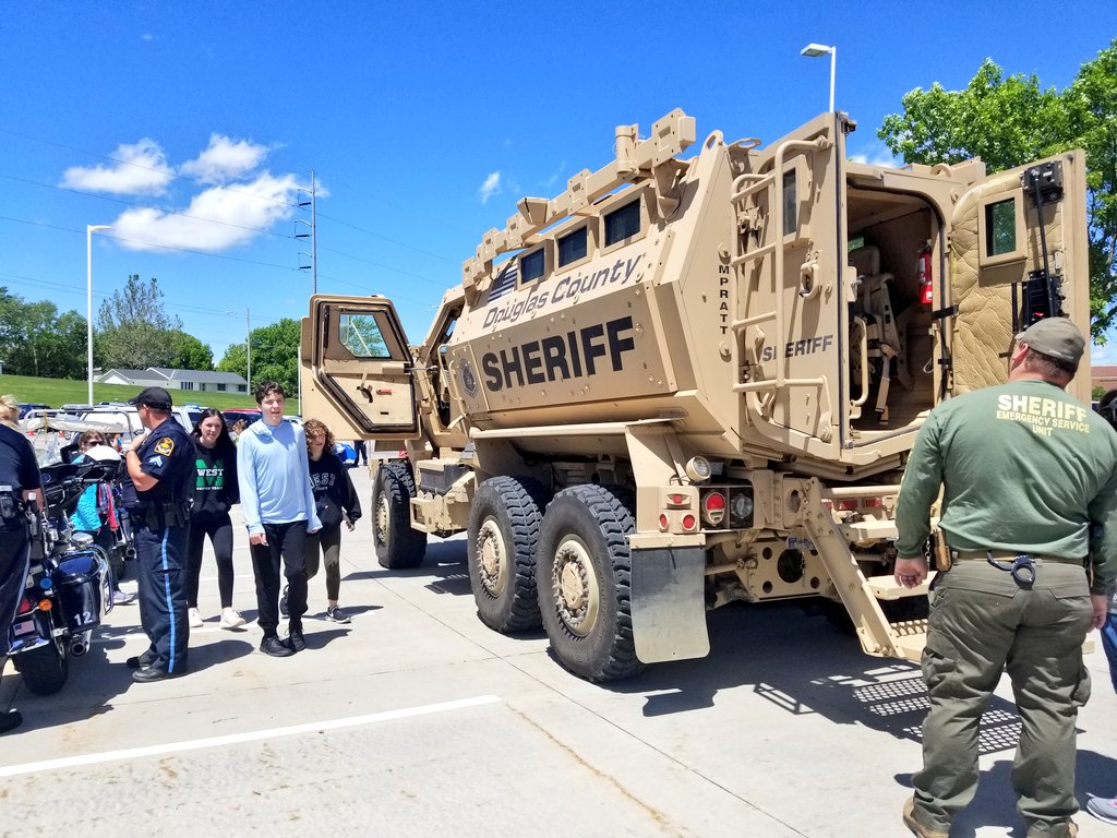 NotOPDVanessa's tweet photo. Today, #OmahaPolice are attending a #SensoryFriendly event at Millard West. Thanks to @DCSheriffNE for coordinating this wonderful event for those with an #intellectualdisability. This is a loud, immersive event to help the kids learn what law enforcement looks like in action. https://t.co/RBWfM1bAld