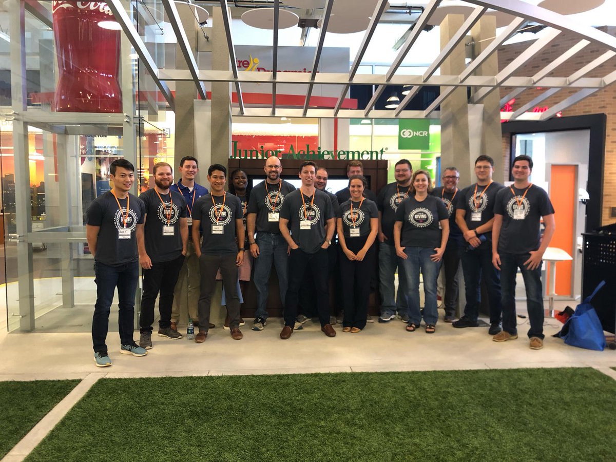 Schellman's tweet photo. .@schellmanco Day of Giving: our Atlanta team volunteered at Junior Achievement BizTown and interacted w/ students in a simulated economy setting as they took on roles of citizen, consumer, employee, & planned for their future beyond classroom walls. #SchellmanCARES #SchellmanDoG https://t.co/IWdeTB3wxv