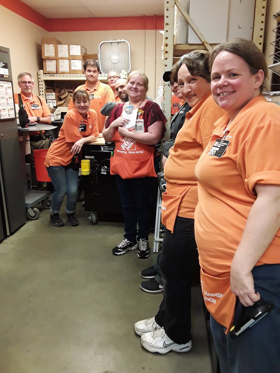 Head Cashier Wanita being celebrated by our MET Team with a Homer Award for keeping the supply room we both share spotlessly clean.  Thank you, Wanita, we appreciate you!