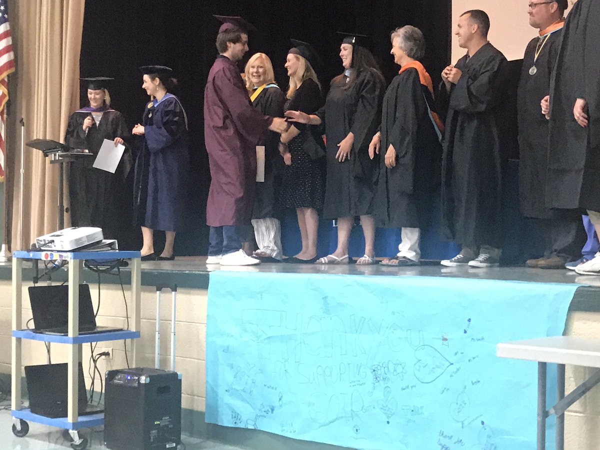 koaks_blair's tweet photo. Shaking hands and being cheered one by former teachers @KCS_Kennedy #OneTribe #GraduationandBeyond #onceacoyotealwaysacoyote https://t.co/mV6bk7eVzZ