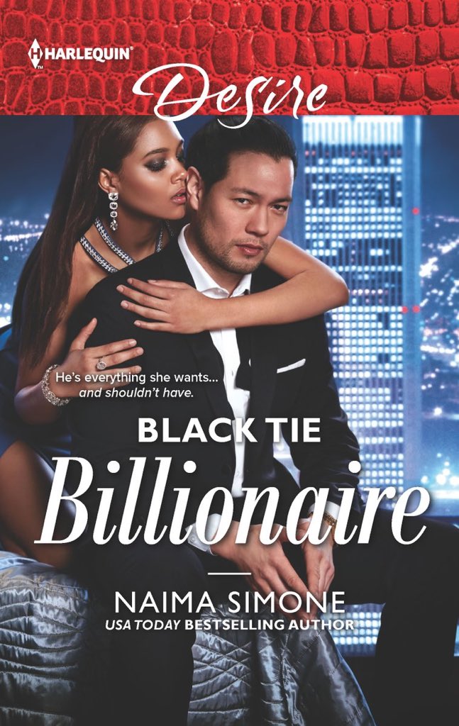 Naima Simone’s Black Tie Billionaire. Cityscape view background. Couple on bed: Black woman in dress with long straight hair embracing Asian man in suit (who is giving the camera a sexy stare) from behind