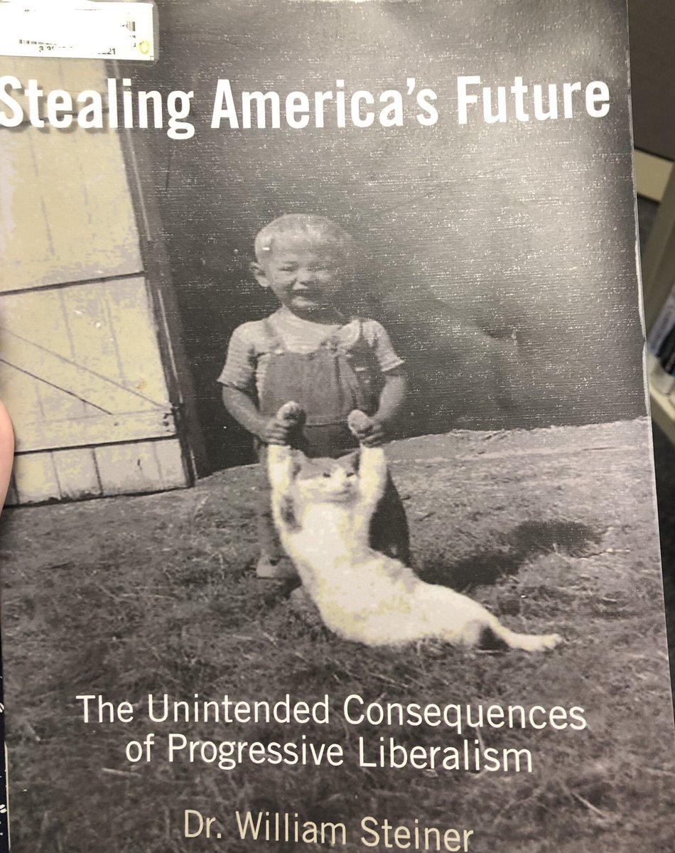 librarianrage's tweet photo. The kid represents progressive liberalism. The cat is America’s future. https://t.co/AfyKIwBvuj