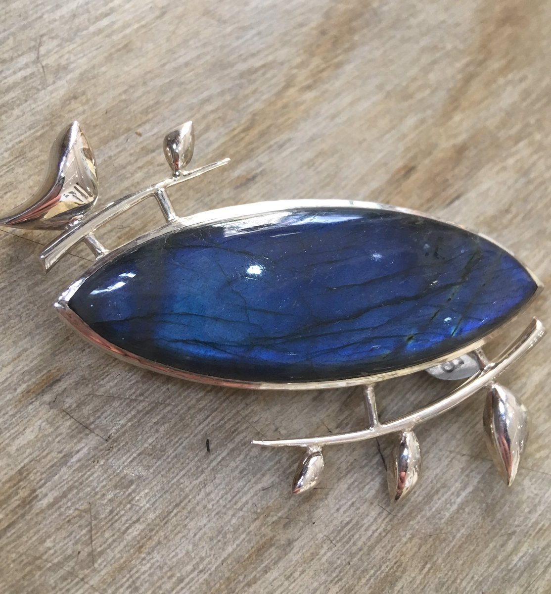 This beautiful #Labradorite &amp; #silver #brooch #handcrafted by @beccawjands can be found in our current #Tweet #exhibition until 22nd June.  Inspired by the beauty of #birds Becca makes #contemporary #jewellery &amp; #silverware inspired by the #naturalworld bit.ly/2BZxjfB