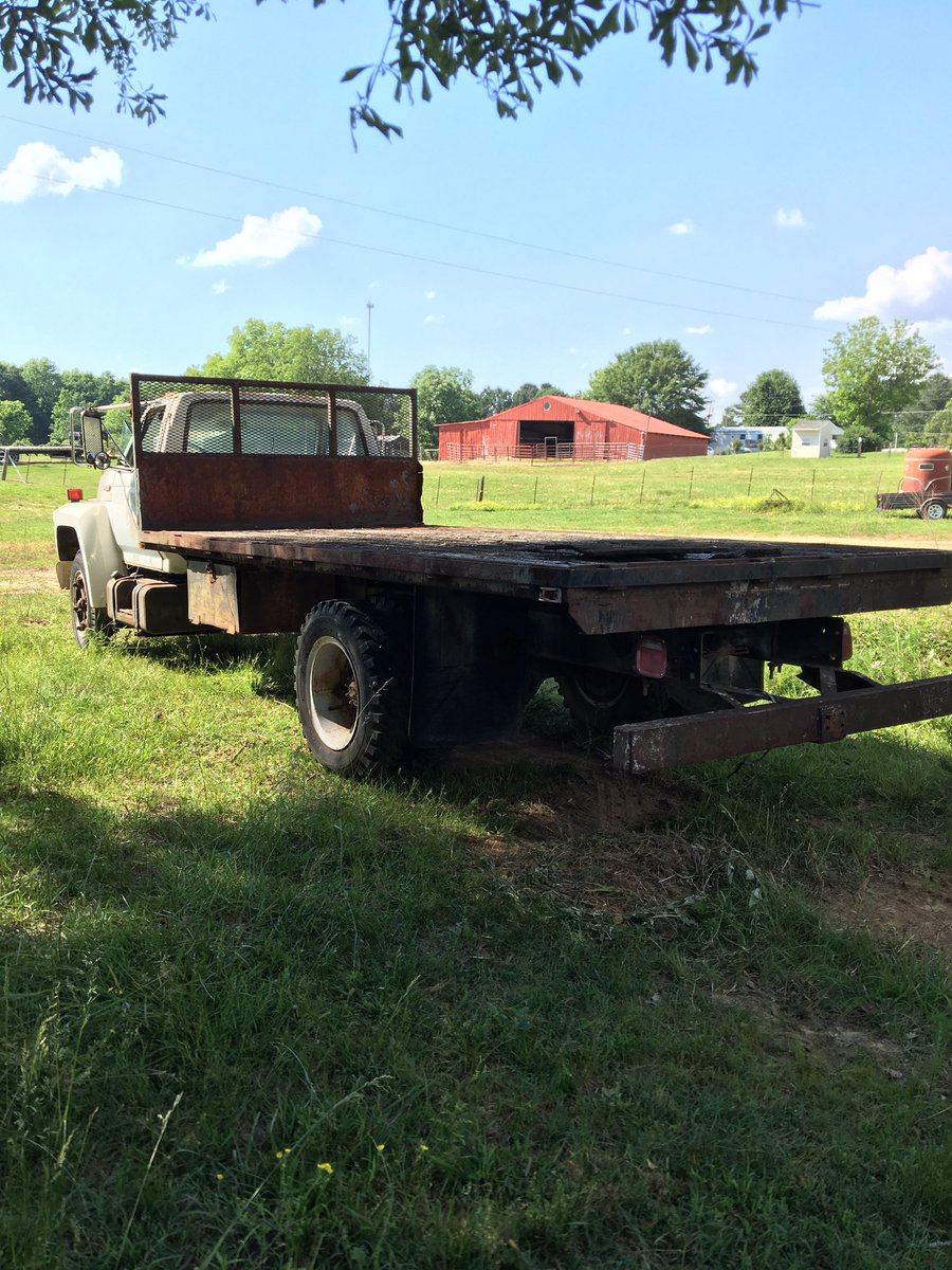 DawsonPresto's tweet photo. So I bought another flatbed. 1990 Ford F-600. Has the 370-2v gas engine, 5 speed with 2 speed rear. Can’t wait to get it running again and make it my work truck https://t.co/2pkPbhIwvA