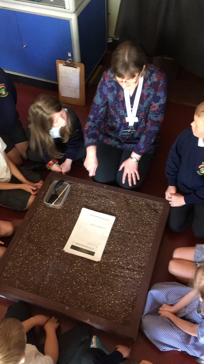 We’re archaeologists now, being briefed about today’s dig ......