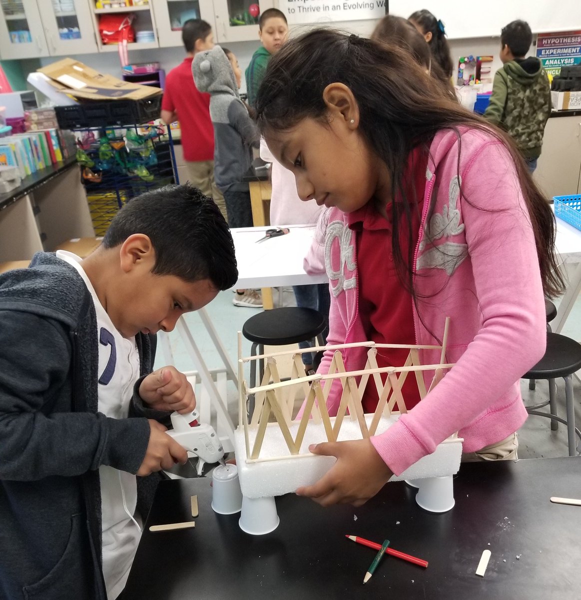 Mrs_GTyree's tweet photo. Collaboration and concentration til the very end! We finished our bridges and tested their strength today. @CorneliusElem 4th graders loved learning about bridges and becoming our very own engineers! #STEAM #TheClassroomsofCornelius https://t.co/E58O2aZhjJ