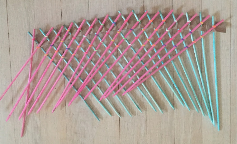 GiftedTawk's tweet photo. Math/Art woven together at angles that stretch. 1st, we dyed skewers in food coloring, then wove rubber bands to create #hyperboloids. Learn more here. https://t.co/dQcGs11fVT @FindMath @1909svdb @FirstInMath @heidi_allum @arsinoepi @bohndrake @onelearningseed @RobertSun24 #math https://t.co/18cwmXFZ0L