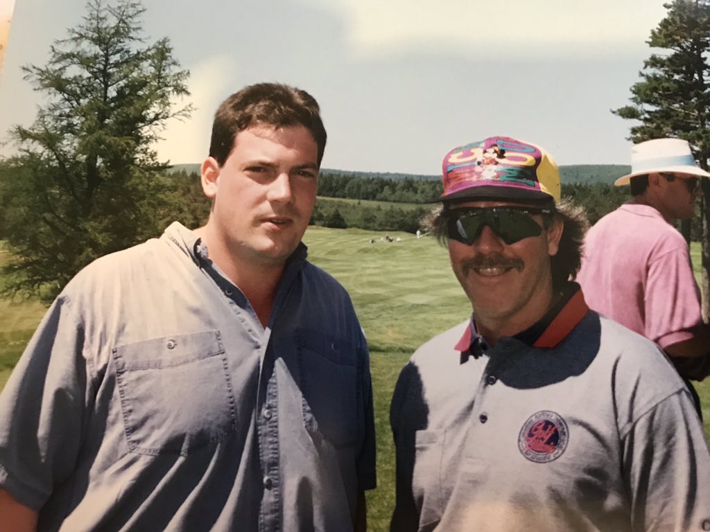DanRTSN's tweet photo. #TBThursday With Billy Smith 25 years ago at a good tournament in Digby, N.S. I got too close and he threatened to slash me with his 6 iron. https://t.co/dc0Fv49AeP
