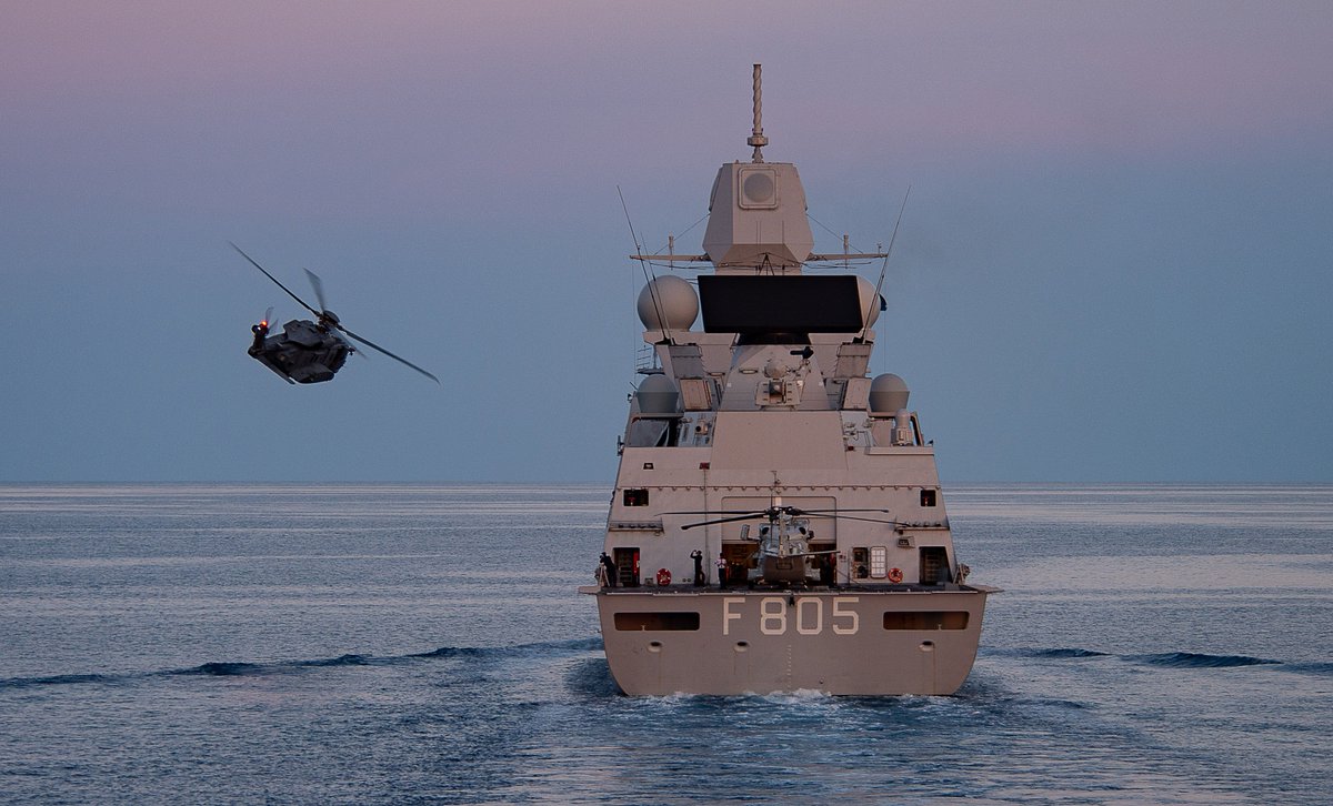 🦖Raptor, the CH-148 Cyclone helicopter attached to Standing #NATO Maritime Group Two (SNMG2) ship 🇨🇦HMCS Toronto flies past Group flagship 🇳🇱HNLMS Evertsen while on patrol in the #MediterraneanSea.