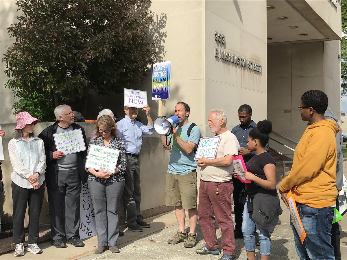 SunriseCNY's tweet photo. Happening now: Climate activists from across Central New York rally to pass the CCPA! #PassTheCCPA #ClimateJusticeCountdown https://t.co/FPiy8L9kjU