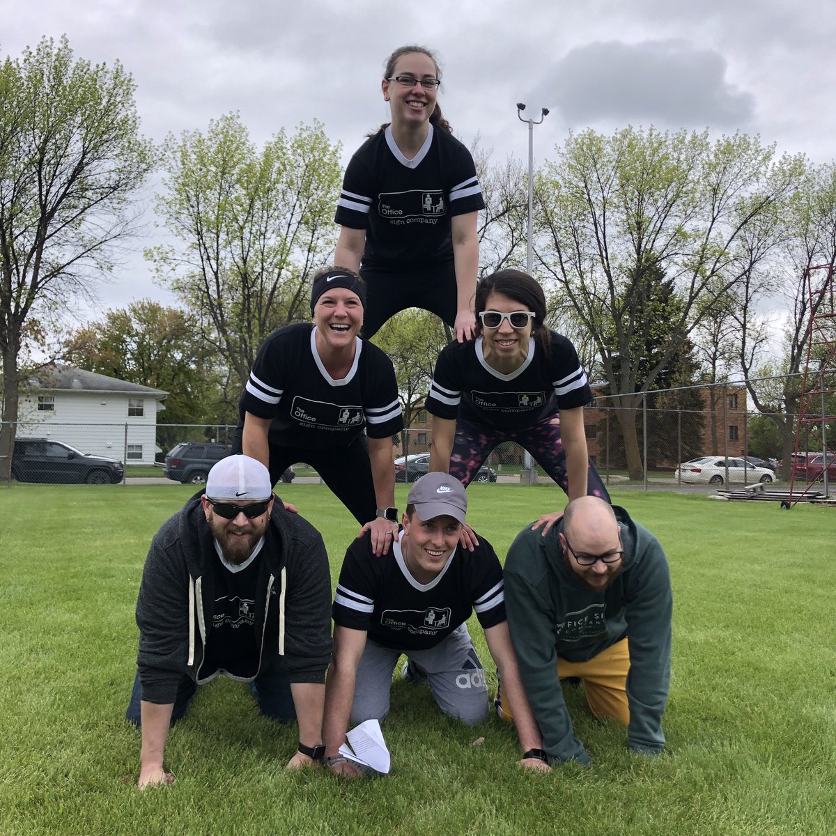 Our human pyramid is in tip-top shape 🔺 #fmwfcorpcup #officesigncompany