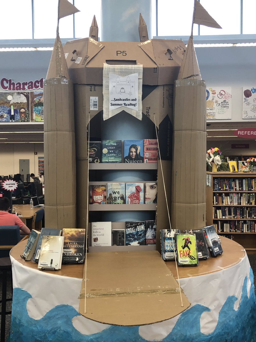 MHSSMediaCenter's tweet photo. Media Center Interns designed and built a cardboard “sandcastle” for our summer reading display! #MTPSpride @MHSSPrincipal @DaretoAwesome #middsouthnation https://t.co/Z5a9ZcVEjX