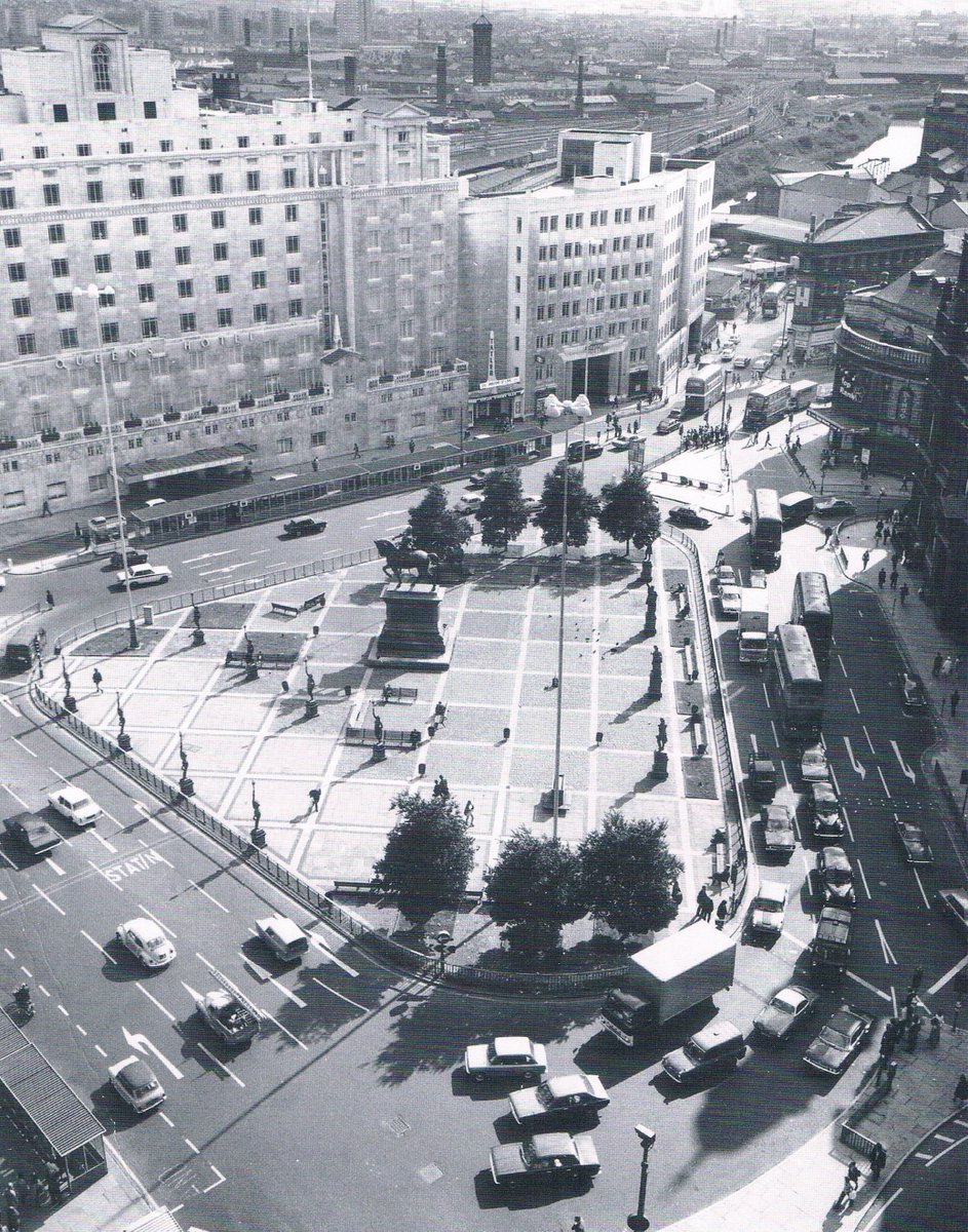 TrueNorthBooks's tweet photo. Recognise this? An elevated view showing traffic manoeuvring around city square, Queens Hotel and #Leeds City Station in the background. https://t.co/0pf7JzHOTc