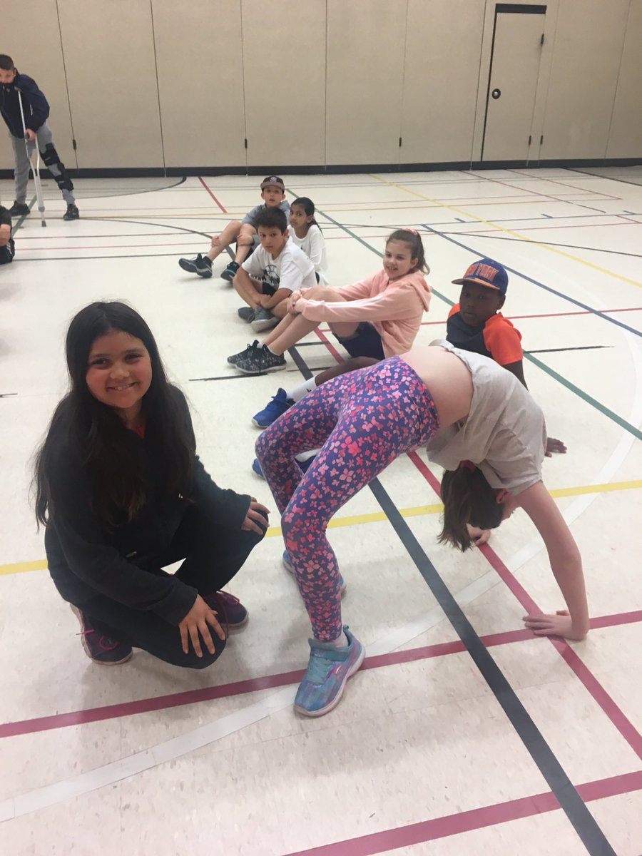 MlleLubert's tweet photo. Here’s a sneak peek at our gym warm up today! Can you tell which letters we are making? https://t.co/rBVS3G34Ek