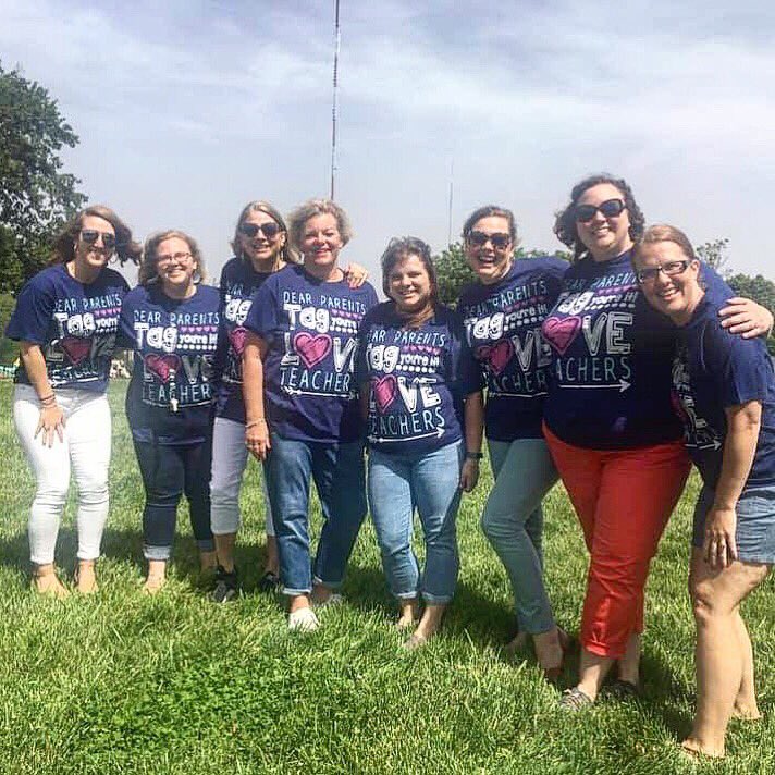HolyCrossStl's tweet photo. The teachers at the JP2 campus celebrated their annual tradition of waiving to families from the hill as they drove off yesterday for the last day of school!
Note their shirts: "Dear Parents, Tag Your It! Love Teachers!" 🤣💙💛 #hca2019 #hcajp2 #hcalastday #catholicstl https://t.co/CiWYaE1x2h