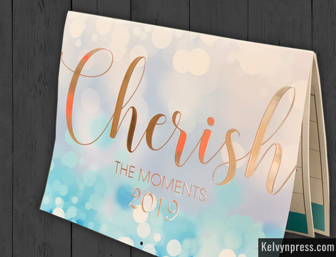 KelvynPress's tweet photo. Check out the cover of a recent custom calendar print job with gold foiling - metallic foil effects.#digitalprinting#printingchicago#customprinting #businessprinting#marketingchicago #chicagoprinter#spotuv #goldfoiling#customcalendars#customcalendarpriting https://t.co/tTtJ2T89Bf