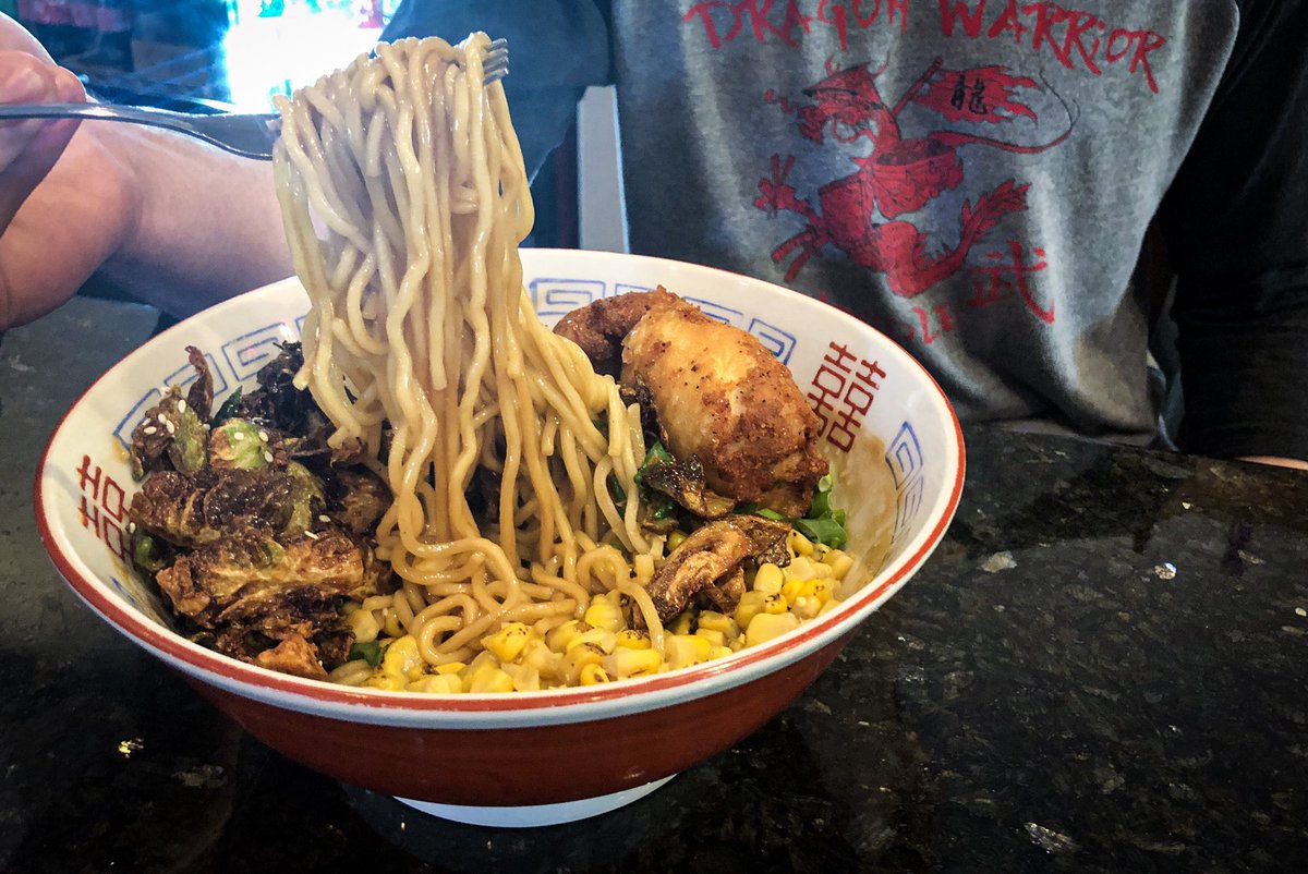 Fried Chicken Ramen bowls are SO GOOD! Try out our broth-less menu items
2-piece fried chicken bowl-ramen noodles tossed in signature dragon sauce, roasted corn, Fried Dragons appetizer(chop fried Brussels Sprouts w/ sweet&amp; spicy sauce),green onions &amp;topped with fried chicken!