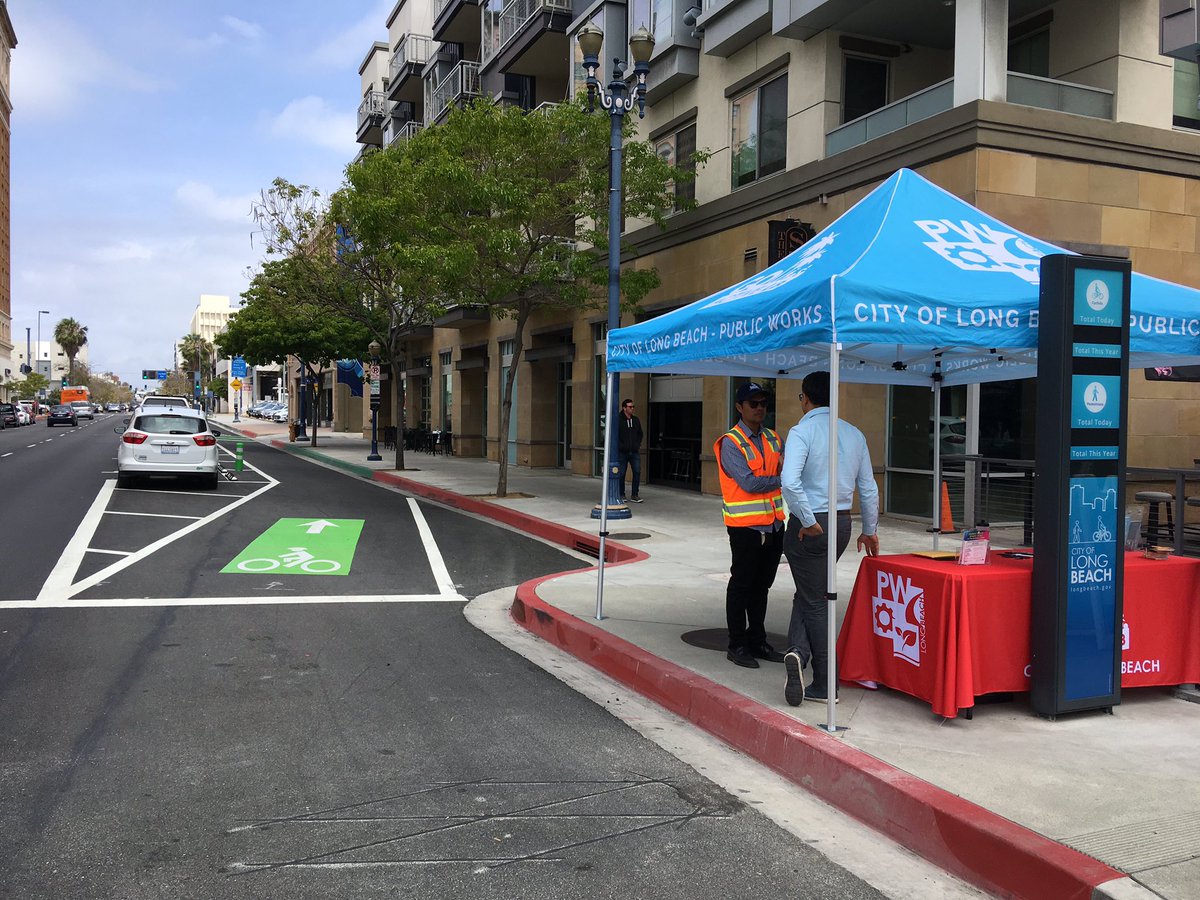 With freshly-minted protected bike lanes along Broadway and 3rd, we’ve been seeing a lot of new riders passing along the corridor. We’re out at Broadway and Promenade. Ride by and say hi!