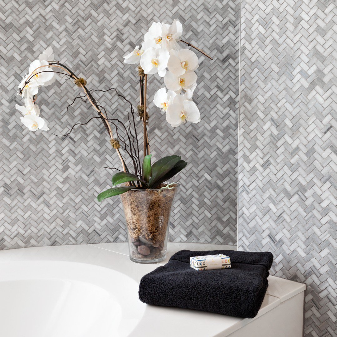 These small herringbone tiles sure know how to make an impact on a room #BBIDLoftyLivingonLonsdale
