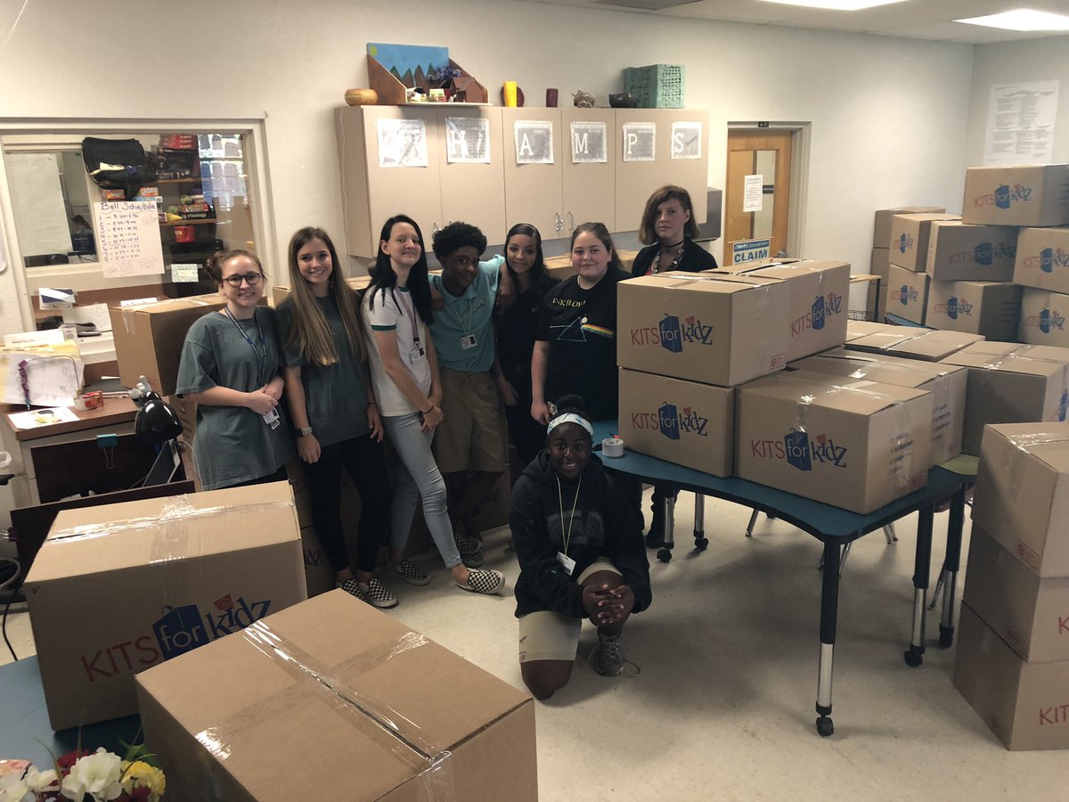 AddictedtoTeac1's tweet photo. So, we did a thing today—300 backpacks for @WorldVisionUSA were packed by 8th graders. Shout out to our guest, Sarah Fortney, as well as my team of amazing volunteers! #promisepacks #JSARocks https://t.co/TyWSAskdqc