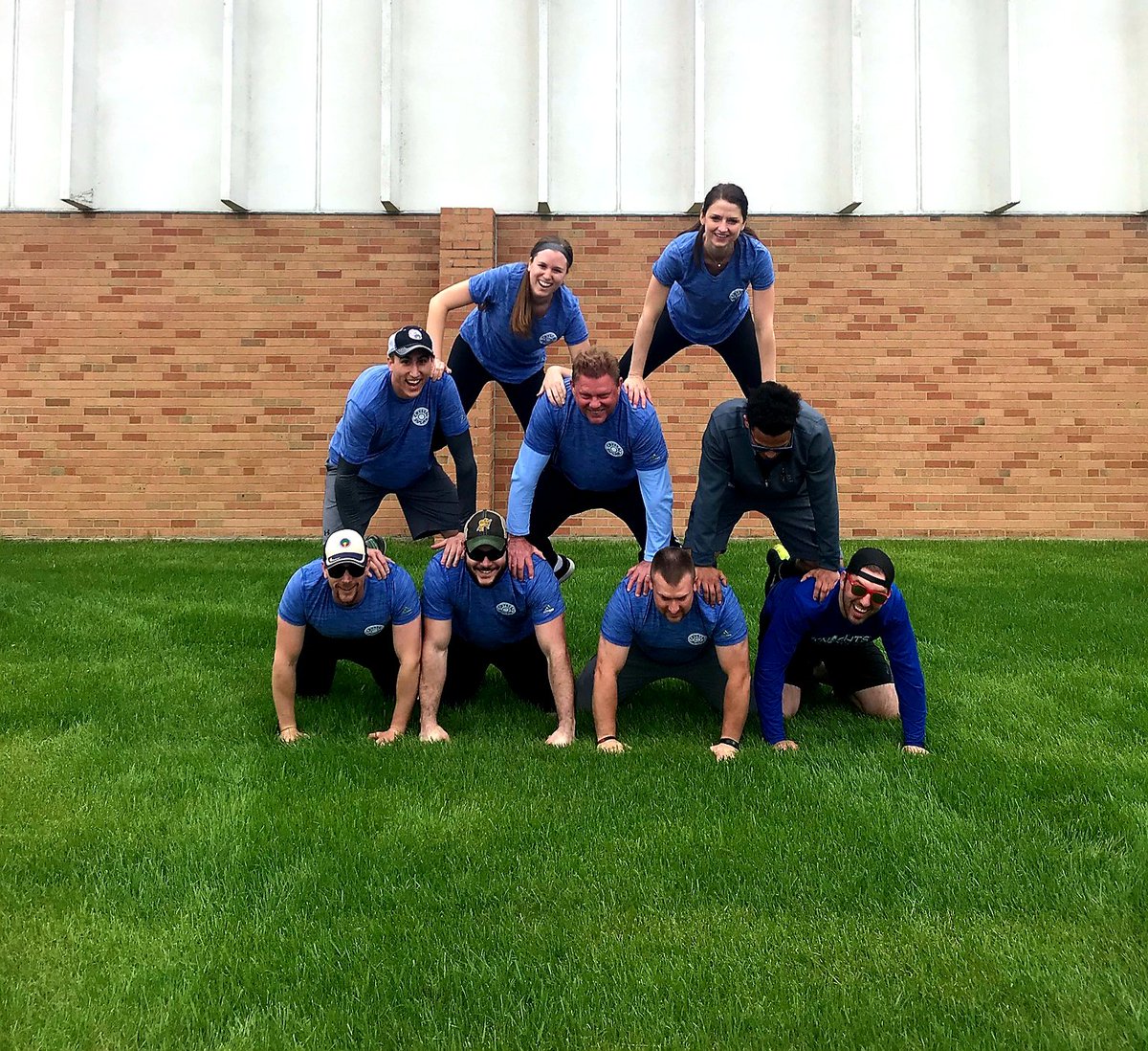 CrystalCoSteph's tweet photo. We thought we'd try our luck at the human pyramid. Yes, we know how to have fun! #FMWFCorpCup @CrystalSugarCo https://t.co/Dc5t5fbxxH