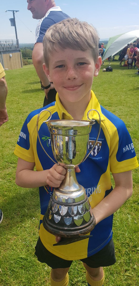 Seren2203's tweet photo. Our boy is an absolute machine, runs like the wind and literally tackles the biggest kid on the pitch😈 Jackson was picked as the player of the tournament and awarded a trophy that has been shared with @gareththomas14 and @RhysWebb_9 hes landed #ianthomastournament #rugby7s https://t.co/5HM6iBjXLA