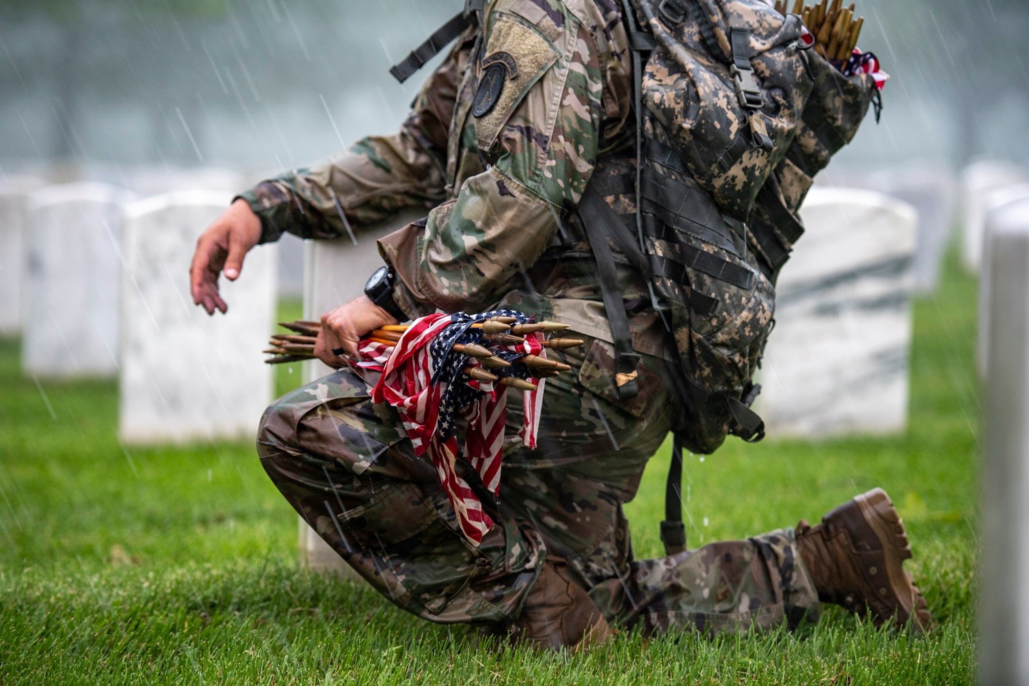 Arlington National Cemetery Soldier From Usarmyoldguard Takes A Knee During A Thunderstorm While Participating In Flags In At Arlington National Cemetery For 55 Years Soldiers From The Old Guard Have Honored