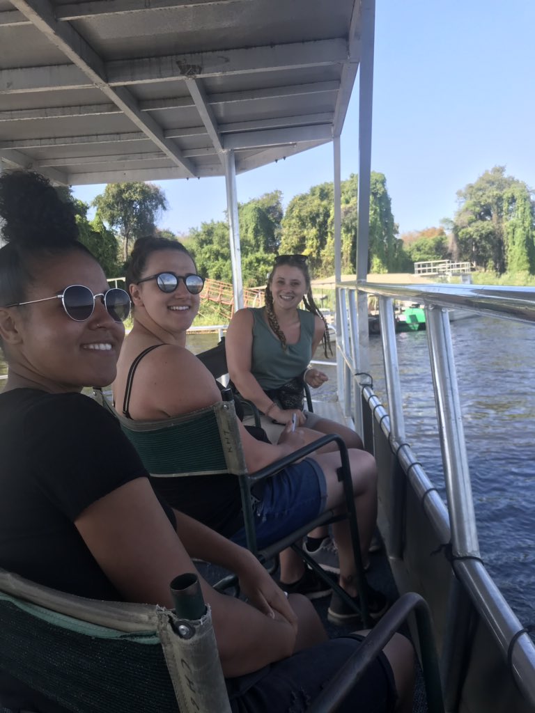 Big smiles from everyone on the boat safari! 🚤
