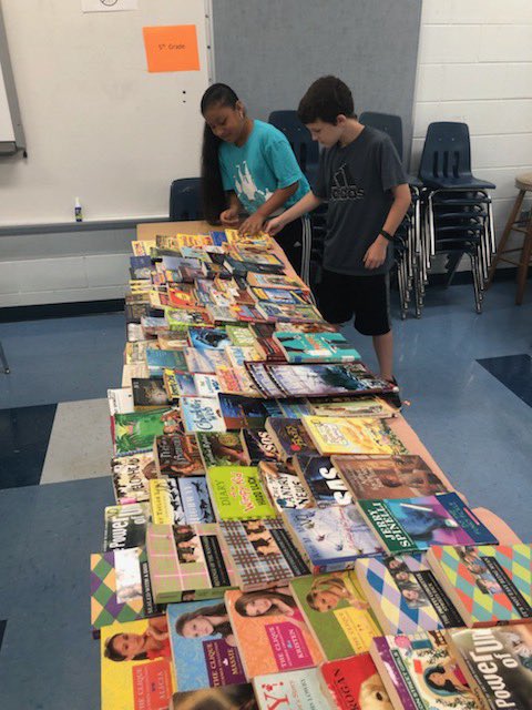 Book shopping for prevention of summer slide.  #bookdrive #readersareleaders <a href="/HCPSArea5/">HCPS Area 5</a>  <a href="/jenniferackett/">Jennifer Ackett</a> @HCPSElemELA @hcpsread