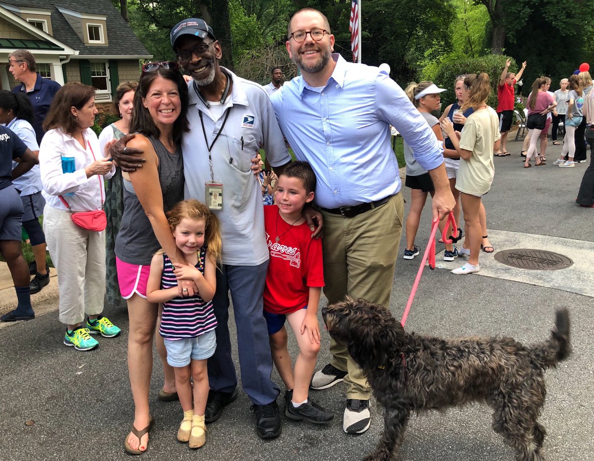 Lots of people took photos with their pets.  #MrFloyd is much loved among the canine set, too. He always kept Milk Bones in his mail truck! In this photo, Stella joined her people, the Courtoy family.
