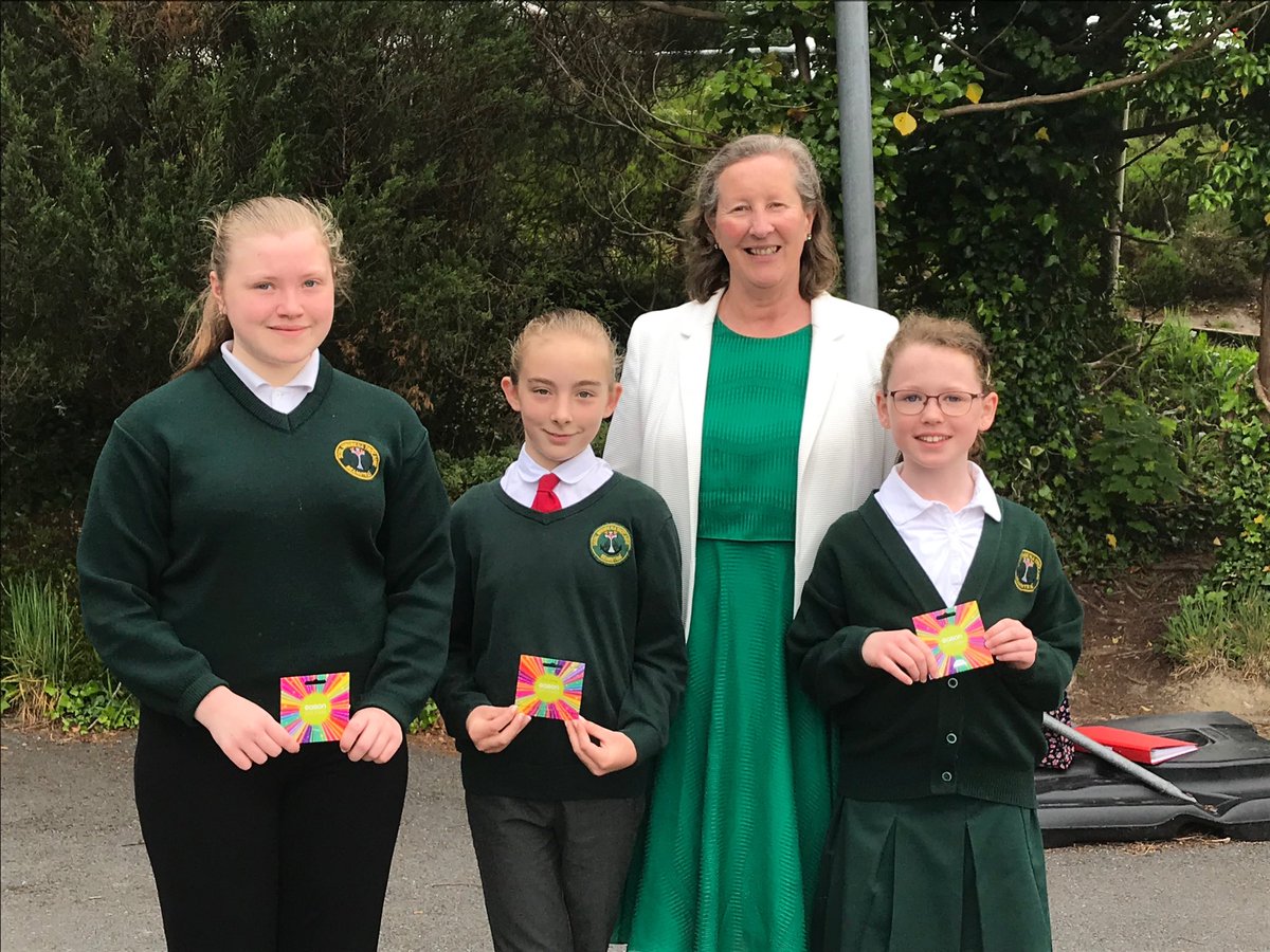 WCEC1's tweet photo. Heritage of Ireland emoji prize winners in West Cork. Director Dr Dympna Daly presenting book tokens to three lucky pupils in Our Lady of Mercy N s, Bantry https://t.co/qMnd9TUqq4