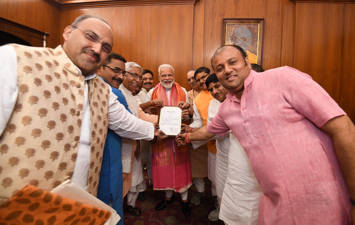 narendramodi's tweet image. Party colleagues from Kashi gave me the official certificate of election from Varanasi Lok Sabha constituency! 

Feel happy to be representing one of the oldest and most vibrant centres of Indian culture.