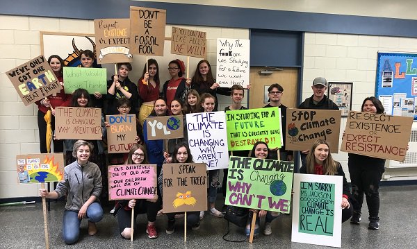 gimlihighschool's tweet photo. Off to the Climate Change March in Winnipeg today.  Absolutely love the signs!  Strong messages from strong students!  #LakerPride https://t.co/GSzUDrnrMj