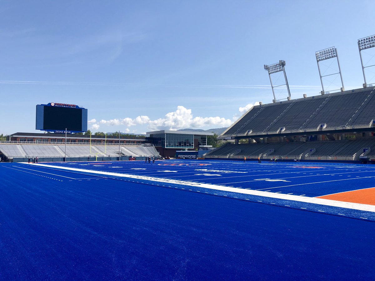 BJRains's tweet photo. New blue turf is just about done, and it’s a remarkable improvement. Bringing it all the way to the stands looks so much better. https://t.co/FaAD8MJyPI
