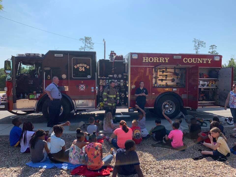 hcfirerescue's tweet photo. Horry County Fire Rescue units from Station 34 joined the kids at Daisy Elementary School for Career Day.
It’s a hot one! A great to open up some hoses!
#HCFR #HCFREMS #CareerDay https://t.co/opBoOZcQ9Z