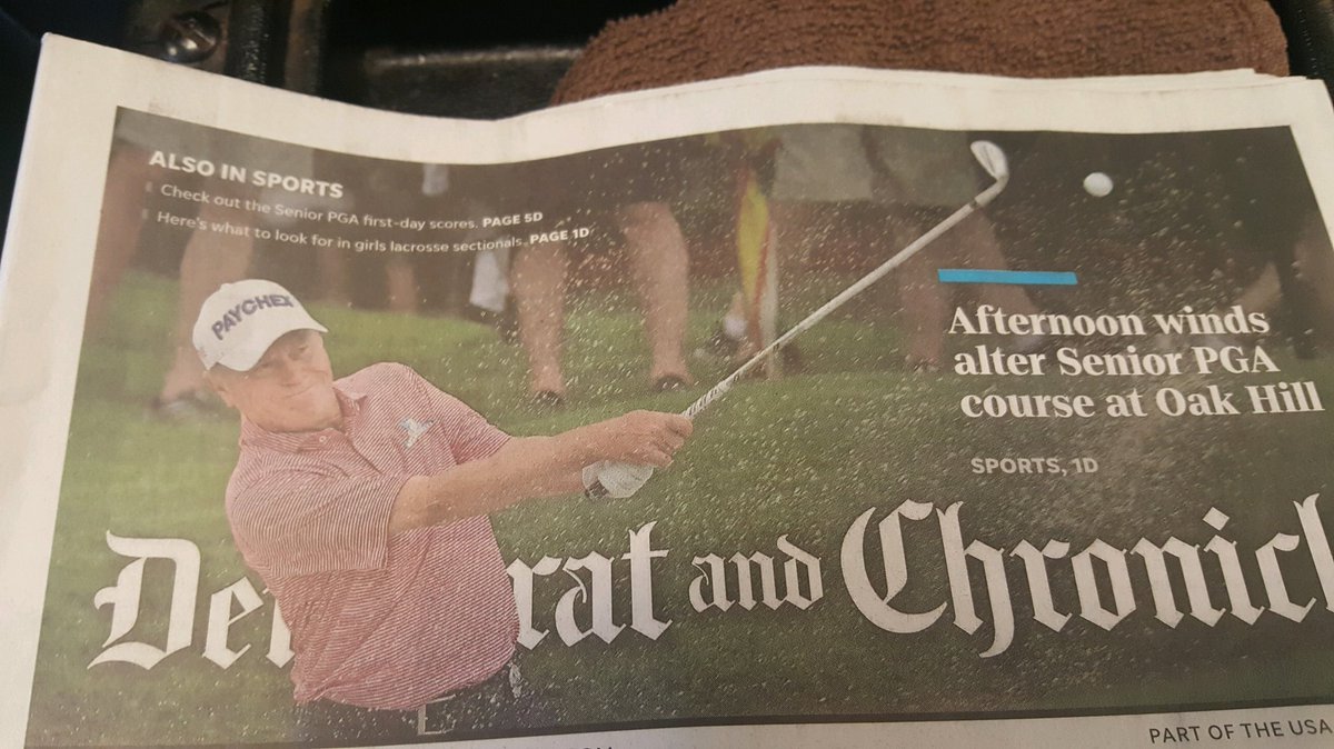 freaKing27's tweet photo. When my dad says "I'm on the front page!" His legs with the umbrella 😂 #jeffsluman #seniorpga https://t.co/la7Hb40swz