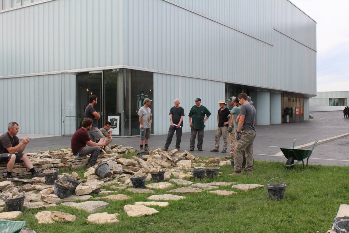 nelson_atkins's tweet photo. If you haven't seen Andy Goldsworthy's "Walking Wall" in the middle of Rockhill Road, get to the museum this weekend. Andy and the crew will start moving stones from the street on Saturday. They will be working Memorial Day AND we're open! Our first #hotsummerKC MondayFUNDAY. https://t.co/pcWfniOxni
