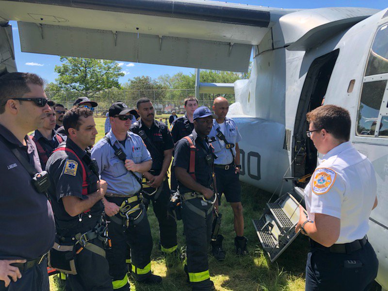 FDNY's tweet photo. #FDNY members from #Ladder125 #Engine326 #Engine260 #Battalion52 #Station54 assisted at today’s @USMC landing at Kissena Corridor Park in #Queens. While the helicopter landed, units stood by with foam, dry chemical, and extraction equipment. https://t.co/lLjCaUmqTm