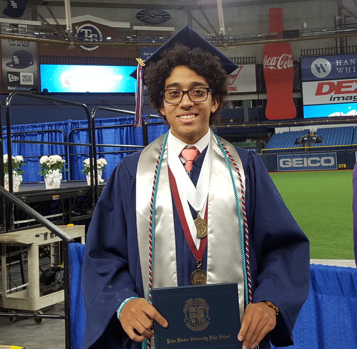 my_pcs's tweet photo. The awarding of diplomas is underway for Palm Harbor University High seniors! #PCSGrads #PHUH #PCSProud https://t.co/bRZwQTLyQB