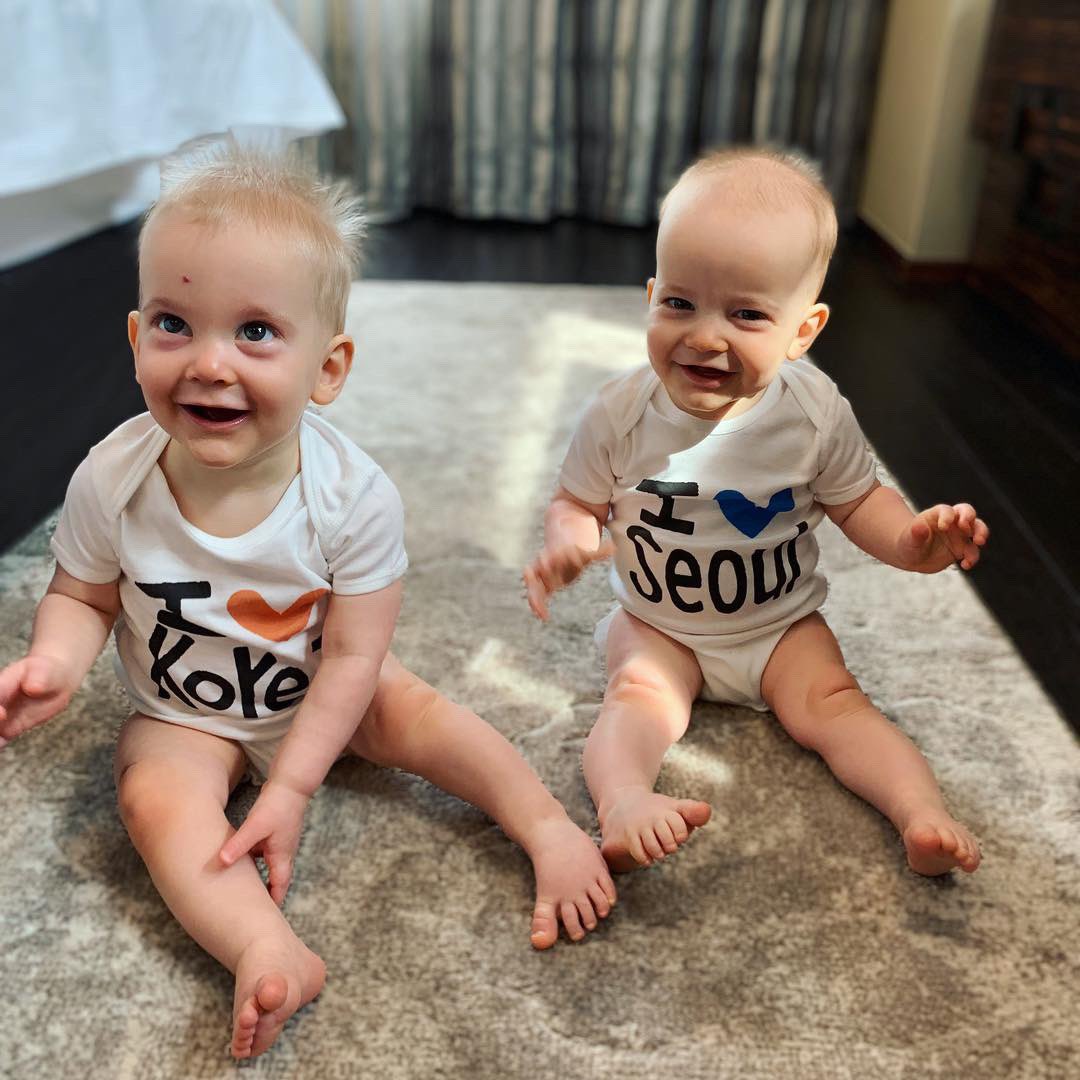 ShineTime50's tweet photo. TWO babies. NINE months. ZERO teeth. Happy. Mobile. Crazy. Different. Adorable. Our favorites. Growing too fast. Loving their birth country still. #max&amp;brady #sokoround✌🏼 @t_willy18 https://t.co/I5U4U5L8HU