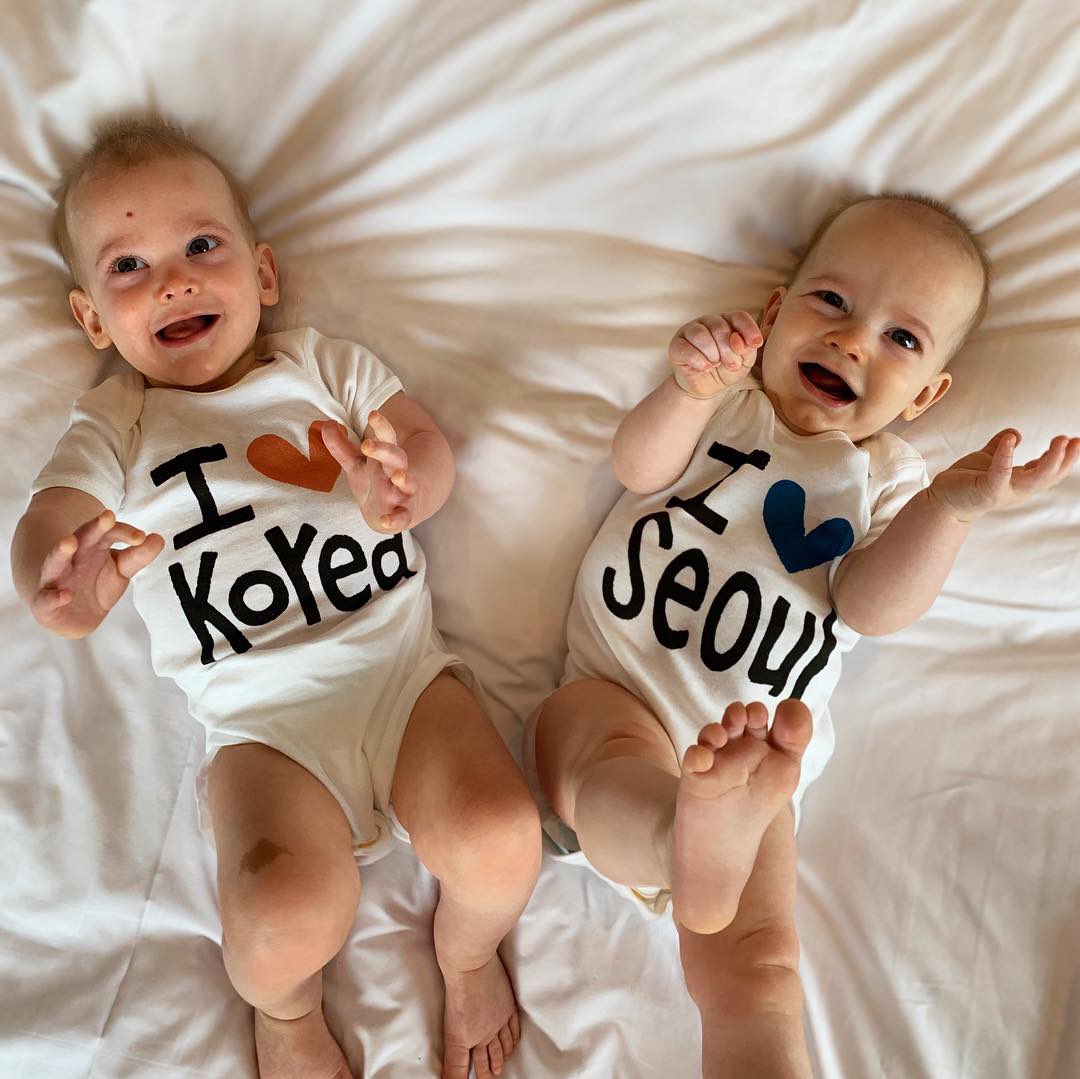 ShineTime50's tweet photo. TWO babies. NINE months. ZERO teeth. Happy. Mobile. Crazy. Different. Adorable. Our favorites. Growing too fast. Loving their birth country still. #max&amp;brady #sokoround✌🏼 @t_willy18 https://t.co/I5U4U5L8HU