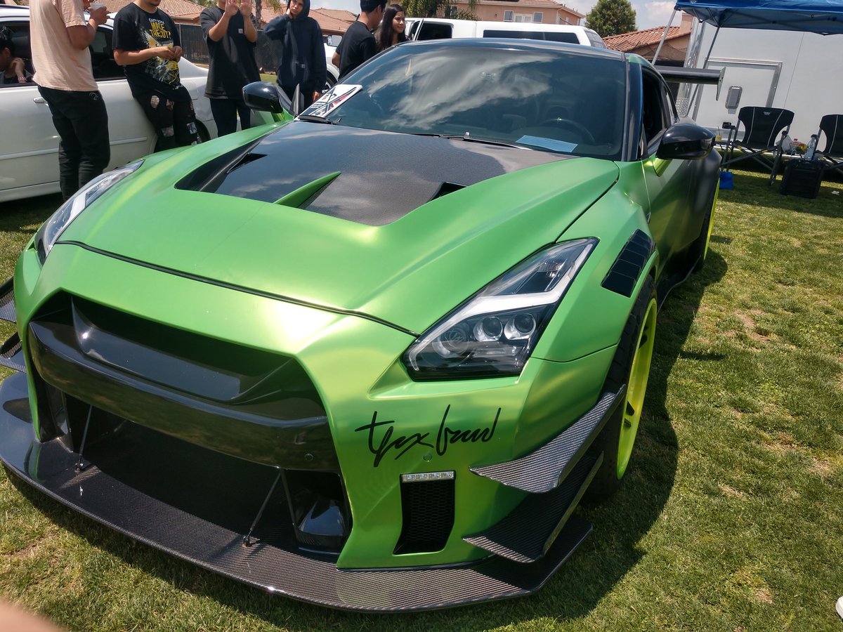 SUSD_SangerHigh's tweet photo. Today @ our 2019 Car Show, George Martinez, a 2005 SHS graduate, presented Tanner Fox's #guaczilla! George has valued the car at about half a million dollars, including all the upgrades!! Here's a few pictures of the car! https://t.co/JaGVKXGs0i