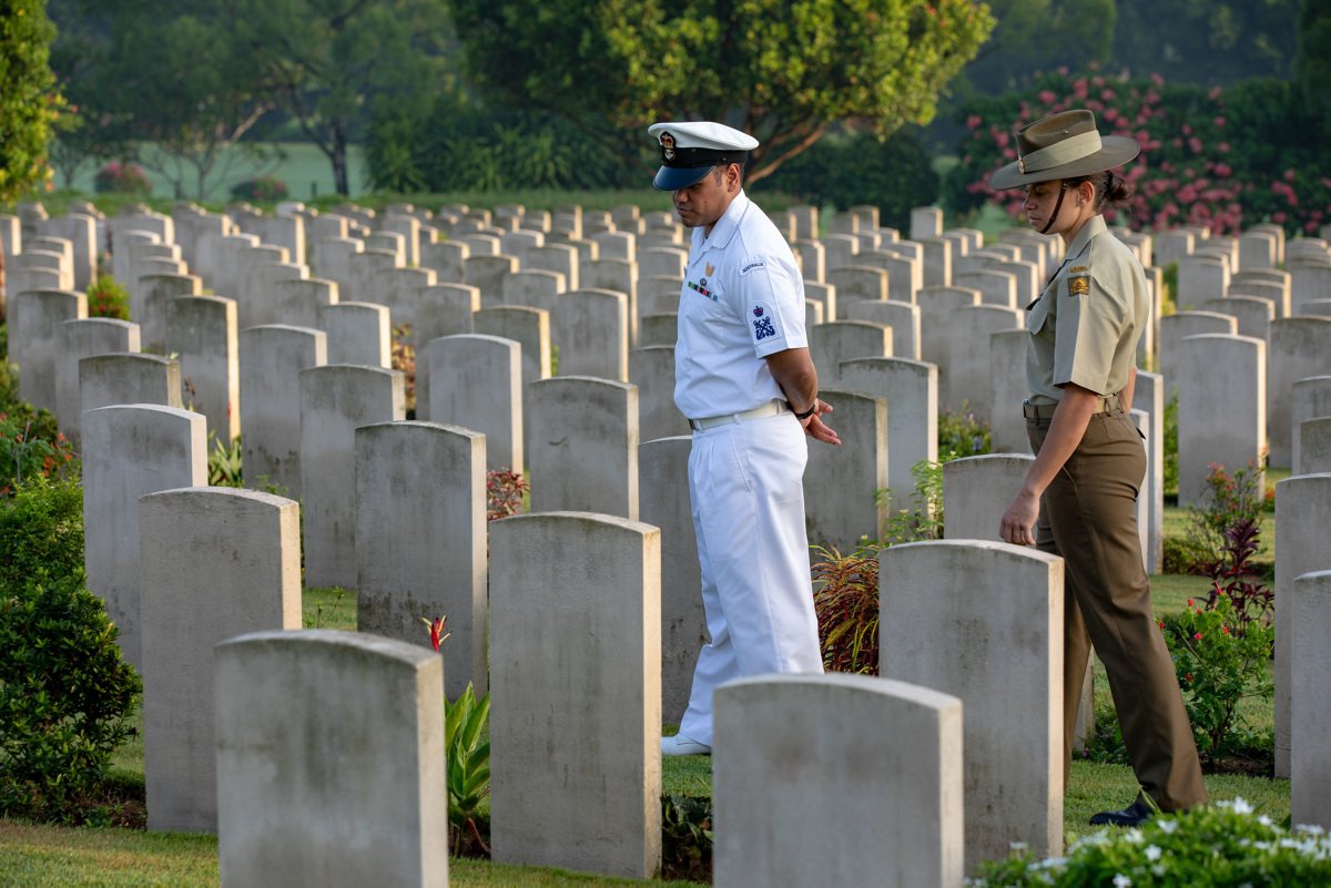 DefenceAust's tweet photo. Members of HMAS Canberra attended a ceremony at Kranji War Cemetery in Singapore to remember those who died defending Singapore & Malaya during WWII. Among the 4400 casualties are 9 Indigenous soldiers who paid the ultimate sacrifice. #IPE19
https://t.co/t8Ko9xaR4H https://t.co/PmAgI4ePFz