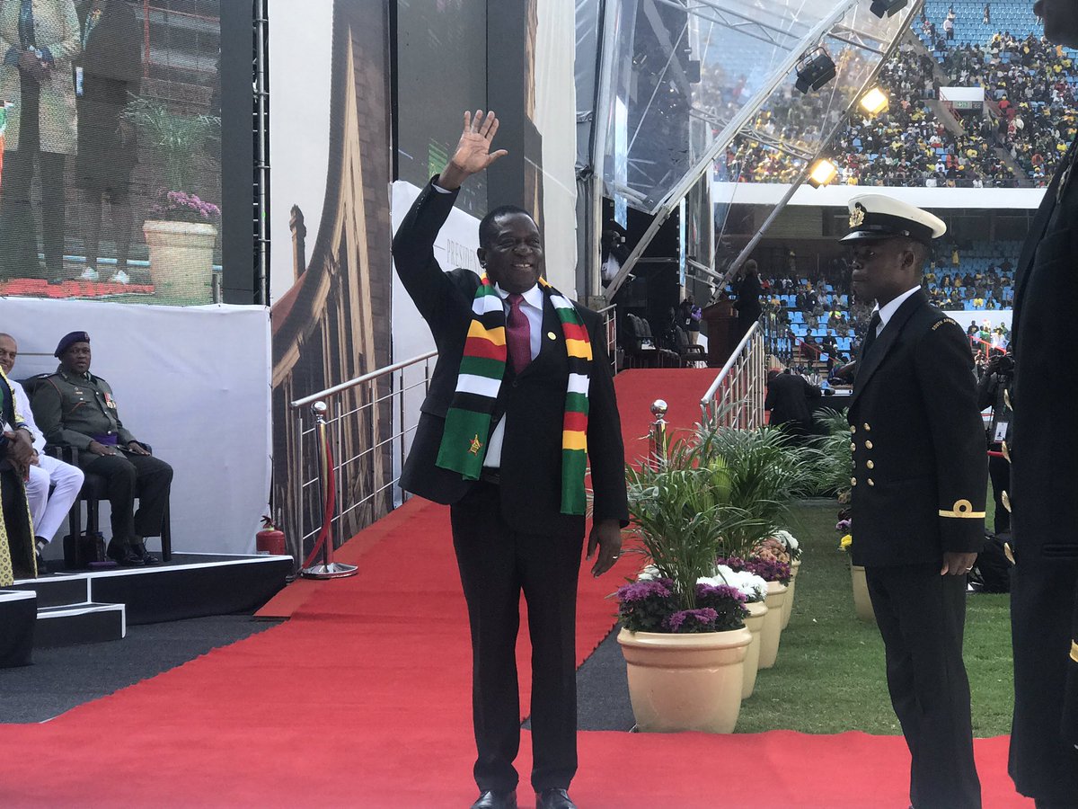 TeamNews24's tweet photo. The Zimbabwean President Emmerson Mnangagwa greeted by massive cheers from the crowds as he enters the stadium #SAInaguration19 (@AlexMitchley) https://t.co/eM5PrJuUKY