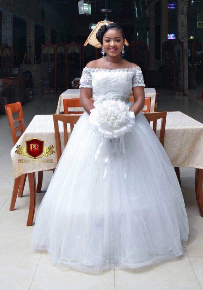 Queenexotic1's tweet photo. Queen's Exotic Fashion 👗✂️, my hand work, both weeding gown and Bukcay Flower, made by me😘, congrats https://t.co/eKpghmAk42