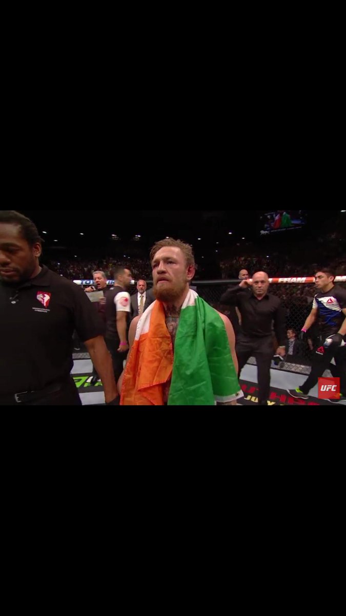 To the racists tweeting me saying Gina Akpe-Moses - who has lived here 95% of her life - isn't Irish because she posed with the flag reversed moments after winning her historic Gold Medal...... here is Conor McGregor moments after winning UFC gold.