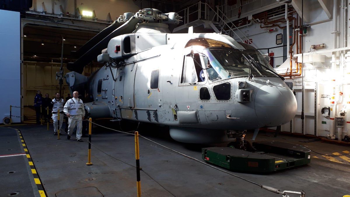RNASCuldrose's tweet photo. @pdnr777 @RFAArgus @RFAHeadquarters Yes @RFAArgus does have a hangar. Hereโs one of our Merlin Mk2s going down the lift to the hangar on - all expertly moved by Aircraft Handlers from 1700 NAS #SafeInTheseHands https://t.co/HQGRB6AUji